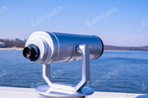 Preview: Tourist binoculars. Binocular telescope on the observation deck for tourism. Sea background. Sopot