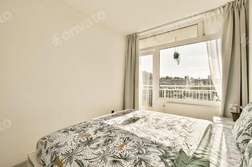 Preview: a bedroom with a bed and a large window
