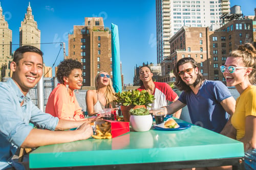 Preview: Group of friends having party on a rooftop