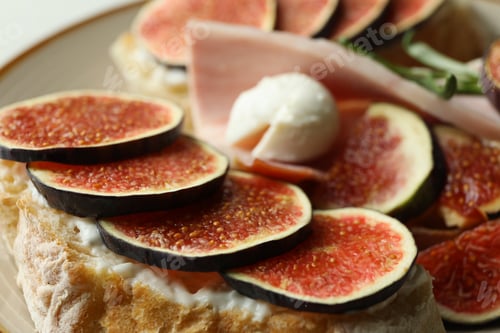 Preview: Concept of tasty food with bruschetta with fig, close up