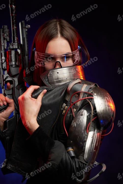 Futuristic woman with eyewear and rifle in dark blue background