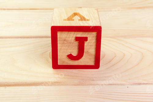 Preview: wooden block alphabet lay on wooden floor