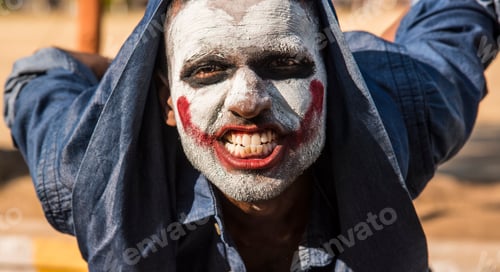 Preview: Close-up portrait of a horrible scary zombie man. Horror. Halloween.
