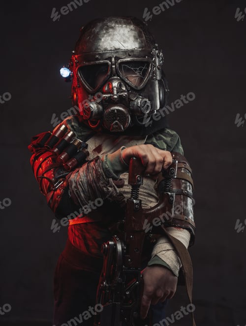 Preview: Armed with riffle little boy with gas mask in dark background