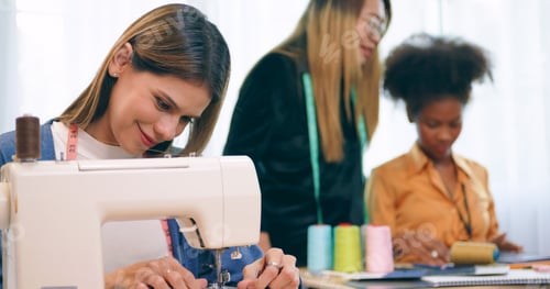 Preview: A group of young women are learning the profession of design and tailoring.