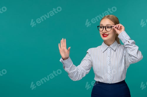 Preview: business lady cute young blonde woman in office outfit and glasses showing stop sign