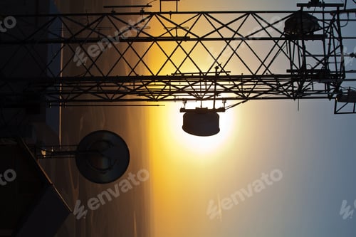 Preview: 54561,Silhouette of communications tower against sunset sky