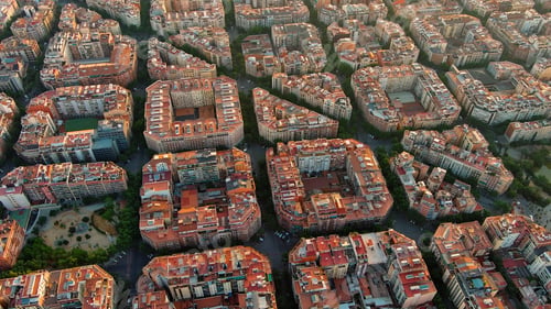 Preview: Barcelona city skyline, aerial view. Eixample residential district at sunrise. Catalonia, Spain