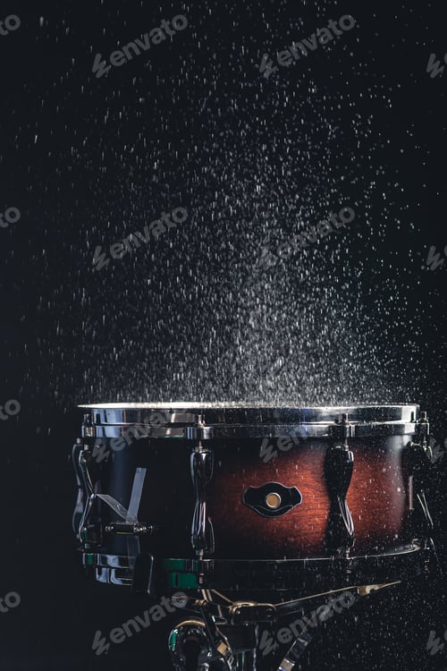 Preview: Beautiful snare drum on a black background, close up.