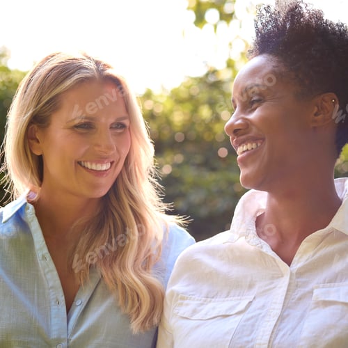 Preview: Two Smiling Mature Female Friends Outdoors Spending Time In Countryside Together