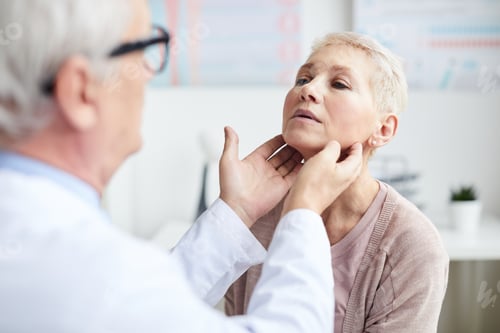 Preview: Doctor checking size of lymph nodes