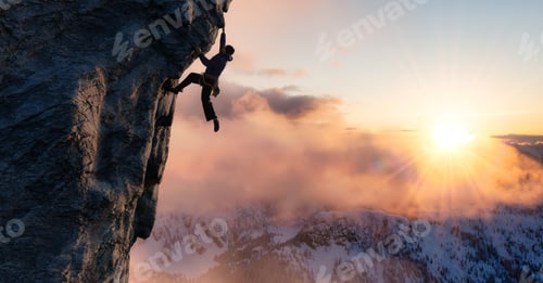 Aperçu: Adult adventurous man Rock Climbing a steep rocky cliff