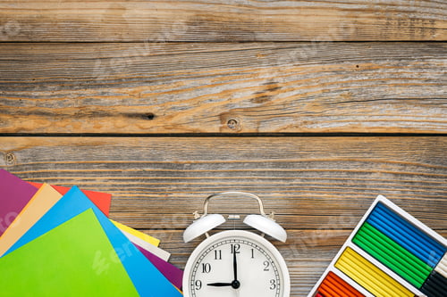Preview: Various school education and office supplies, accessories on a wooden background.
