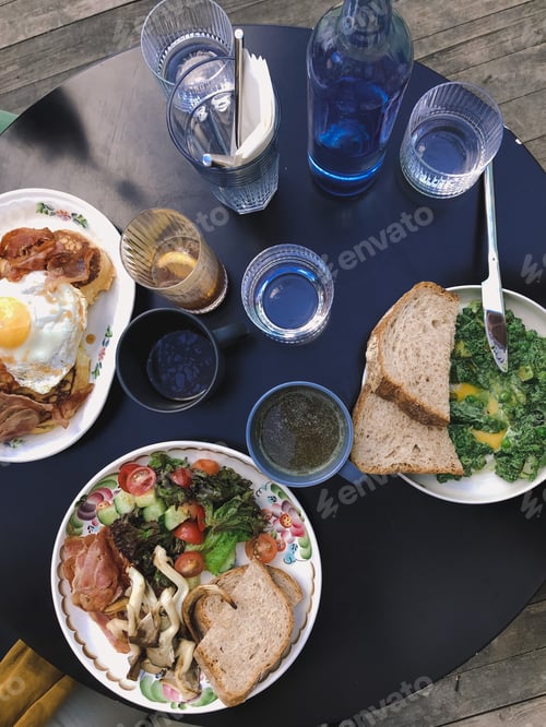 Preview: Top view of breakfast on the summer terrace of the cafe.