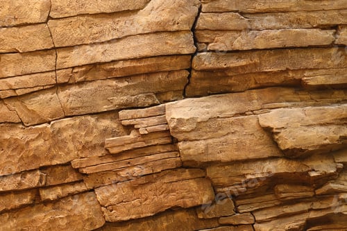 Preview: Light coarse natural rock stone background. Mining cliff rough front surface