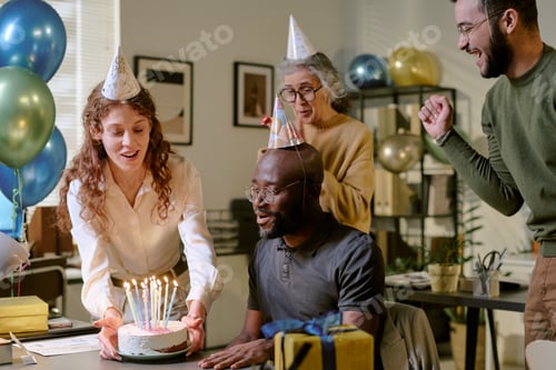 Preview: Multiethnic Coworkers Celebrating Birthday of Middle Aged Black Man at Office