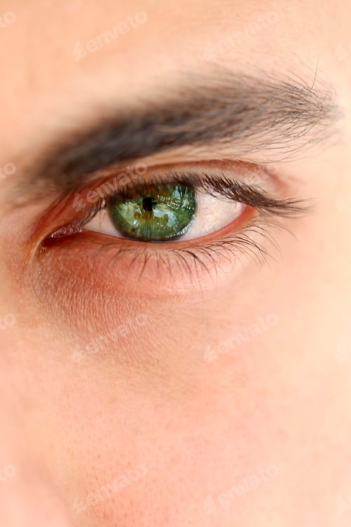 Preview: Closeup on a man eye. Green eye color.
