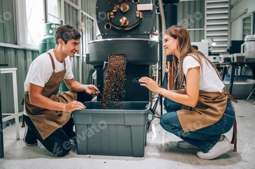 Preview: Young Adult Small Business Owner's Caucasian Couple Woking Together in Coffee Roaster Factory