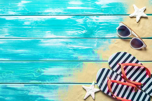 Preview: flip flops on blue wooden floor.