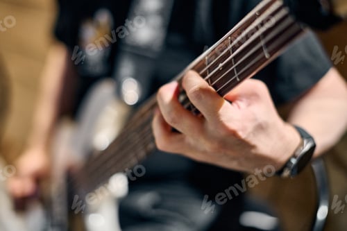 Preview: Music band rehearsal featuring close-up on guitar
