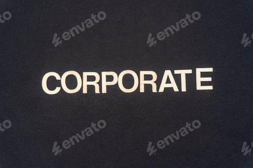 Preview: CORPORATE word written on dark paper background. CORPORATE text for your concepts