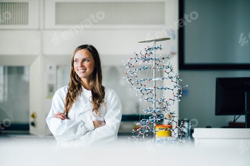 Preview: Confident female scientist in a lab coat smiling beside a DNA model.