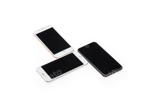 Preview: three smartphones with blank screens isolated on white, communication concept