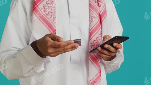 Preview: Islamic guy using banking service
