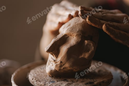 Preview: Young woman sculptor artist creating a bust sculpture