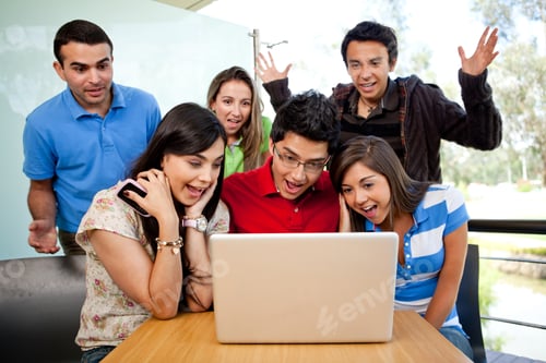 Preview: Group Of Surprised Students At The University With A Computer