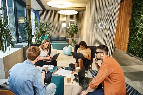 Preview: Innovators co-creating in modern workspace