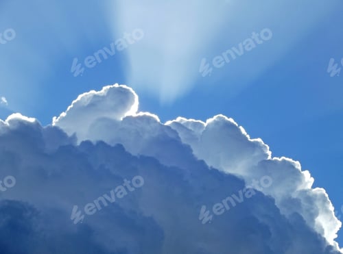 Preview: Rays of sunlight behind a cloud