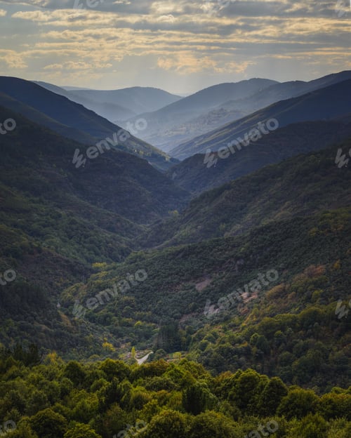 Preview: Huge valley surrounded by mountains covered with forest
