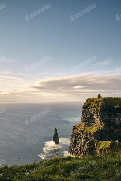 Preview: Vertical shot of Cliffs of Moher Lislorkan Ireland on a cloudy day