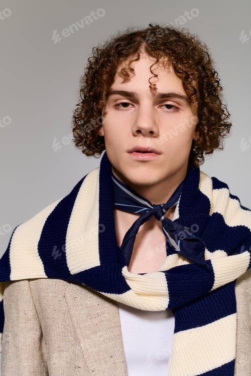 Preview: Stylish teenager showcases vibrant fashion with confidence and flair in a creative setting