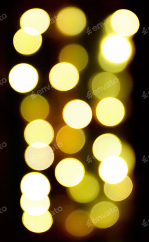Preview: Circular bokeh lights background in golden tones