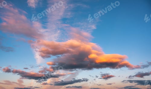 Preview: Colorful sunset clouds in blue sky at the evening