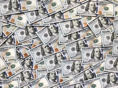 Preview: Top view new styled American hundred dollar bills background abundance at natural light