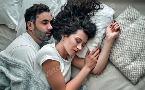 Preview: Young couple in bed