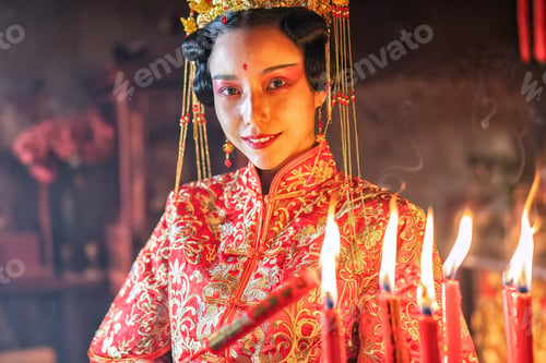 Preview: Girl traditional dress in Chinese pray in temple translation language is 'lucky and healthy'