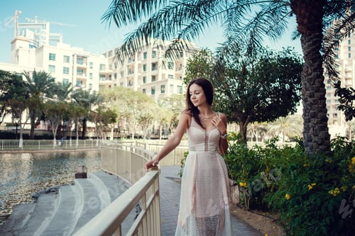 Preview: beautiful woman on a street of Dubai city