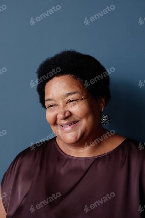 Preview: Smiling Senior African American Woman on Blue