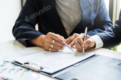 Preview: Signing a business contract. A group of business people at the meeting and sign a together business