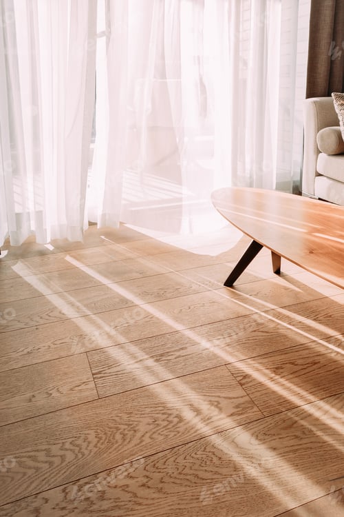 Preview: Modern room interior with an open window in minimal style. Transparent tulle with morning sun rays o