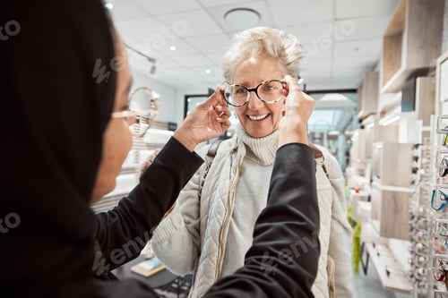 Preview: Eyewear, vision and optometry with a senior woman in an optician office for prescription lenses. Gl