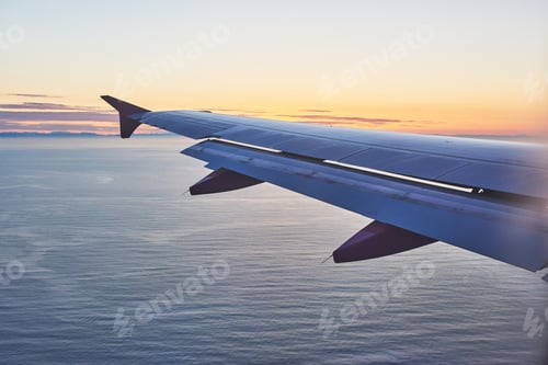 Preview: orning sunrise with Wing of an airplane. Photo applied to tourism operators. picture for add text