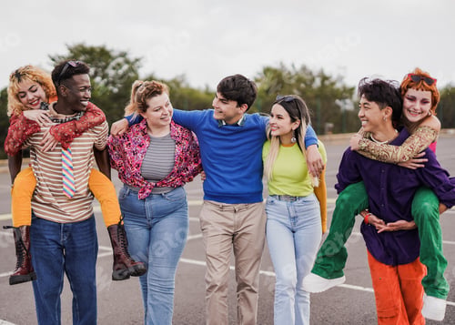 Preview: Group of young friends having fun together outdoor