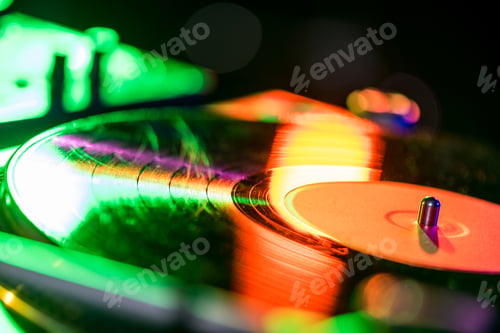 Preview: close up view of sound mixer with vinyl in nightclub