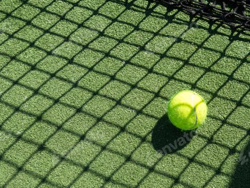 Preview: tennis ball back light shadow on tennis grass court good for background