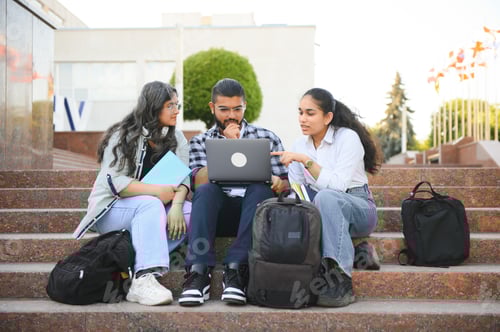 Preview: Group of smiling multiethnic near university campus